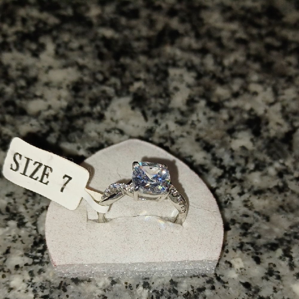 Classic Silver Solitaire Ring with Blue Stone